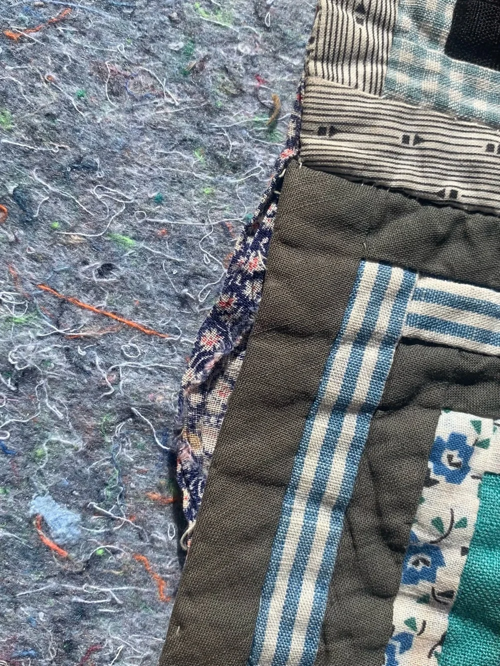 Antique 1940s or older multicolor multi-material log cabin quilt